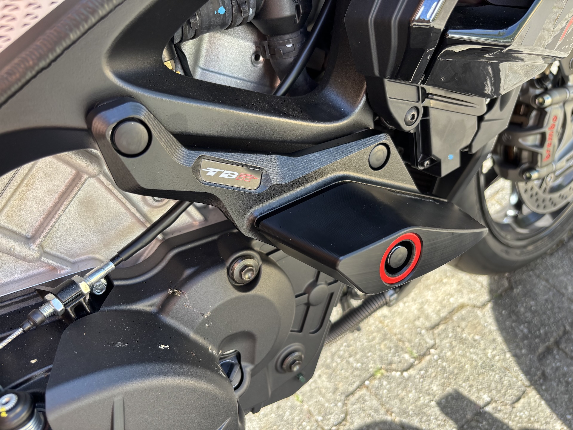 From Triumph Rocket 3 to Aprilia Tuono V4 Factory: Choosing the Right Bike and Installing Top Block Racing Frame Sliders